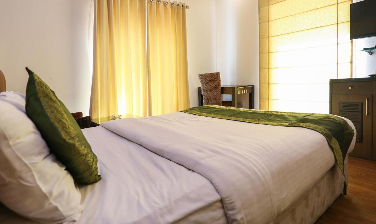 Treebo Trend White Mg Hotel Bangalore Exterior photo
