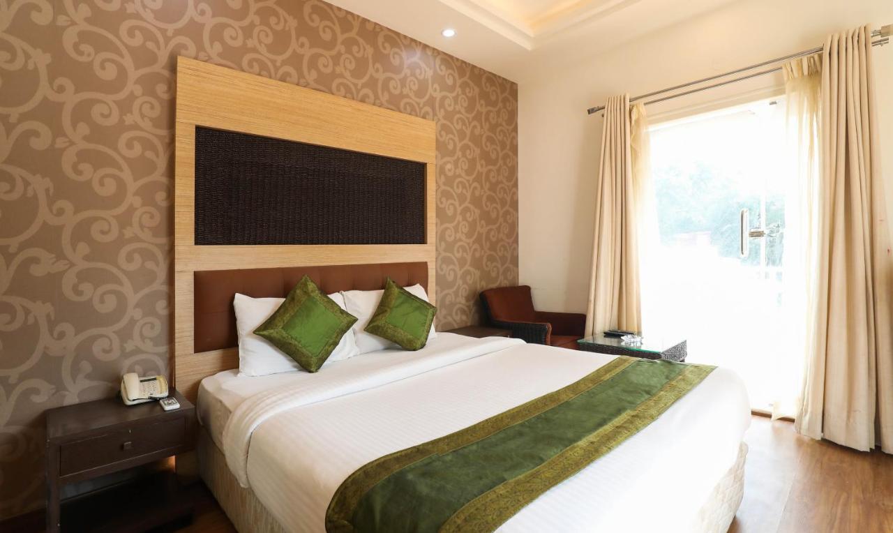 Treebo Trend White Mg Hotel Bangalore Exterior photo